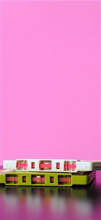 white and green cassette tapes wallpaper