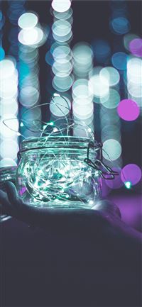 clear glass jar with string lights iPhone 11 wallpaper