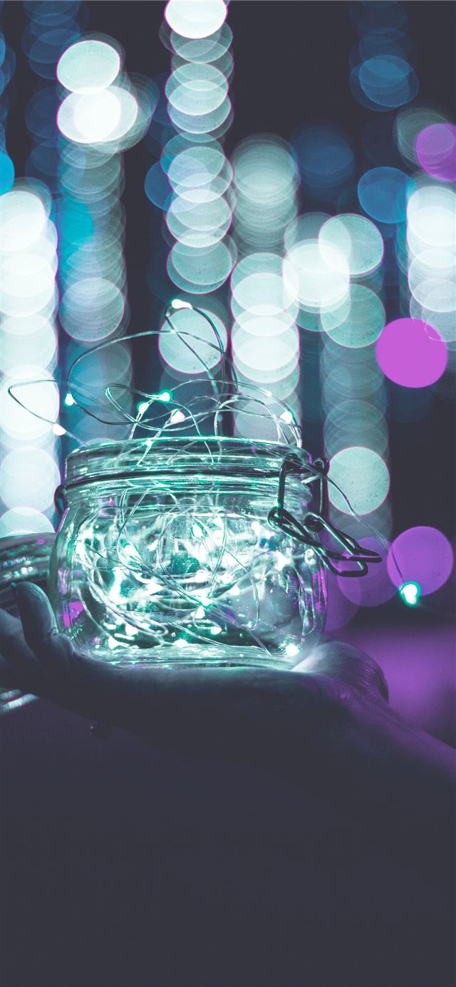 1125x2436 clear glass jar with string lights - bokeh iPhone 11 Wallpaper