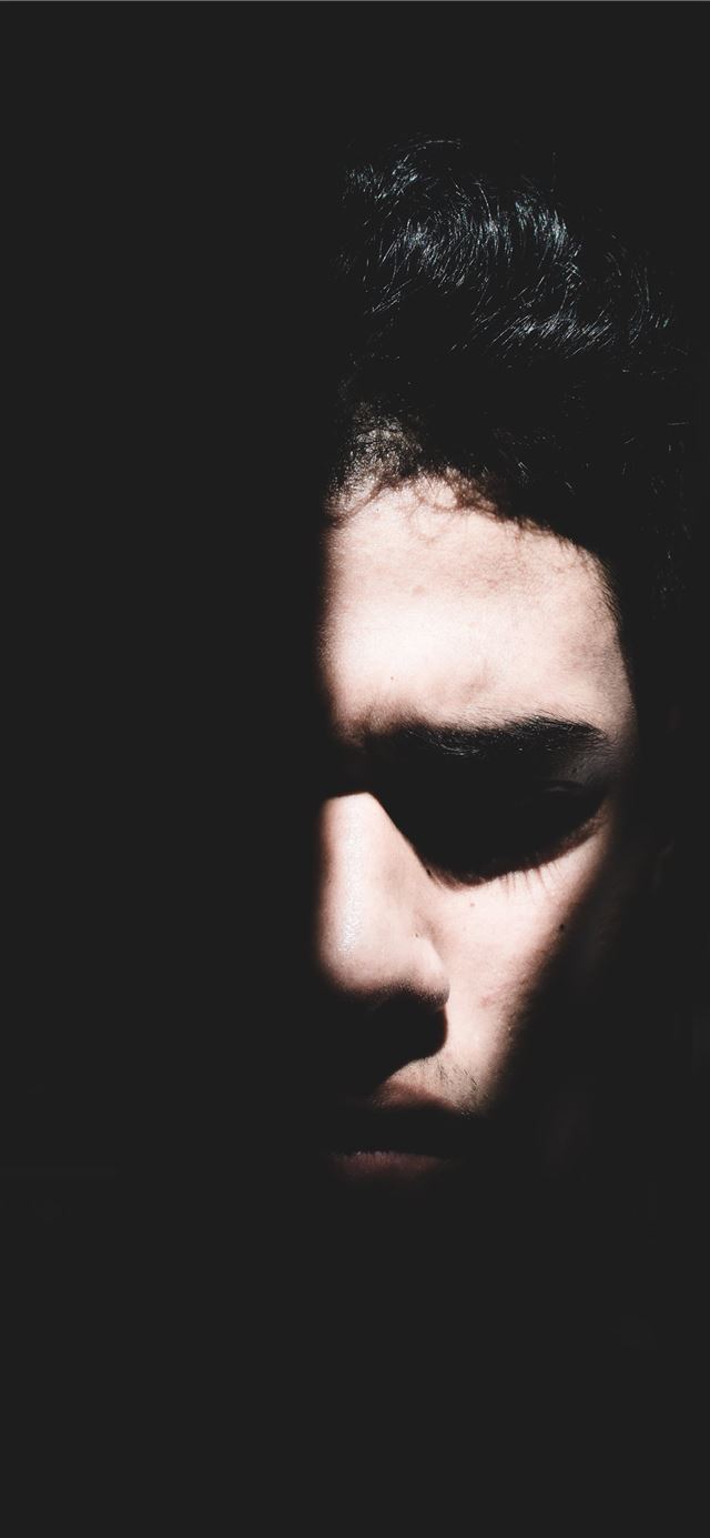 1125x2436 silhouette of half human face - dark (black) iPhone 11 Wallpaper