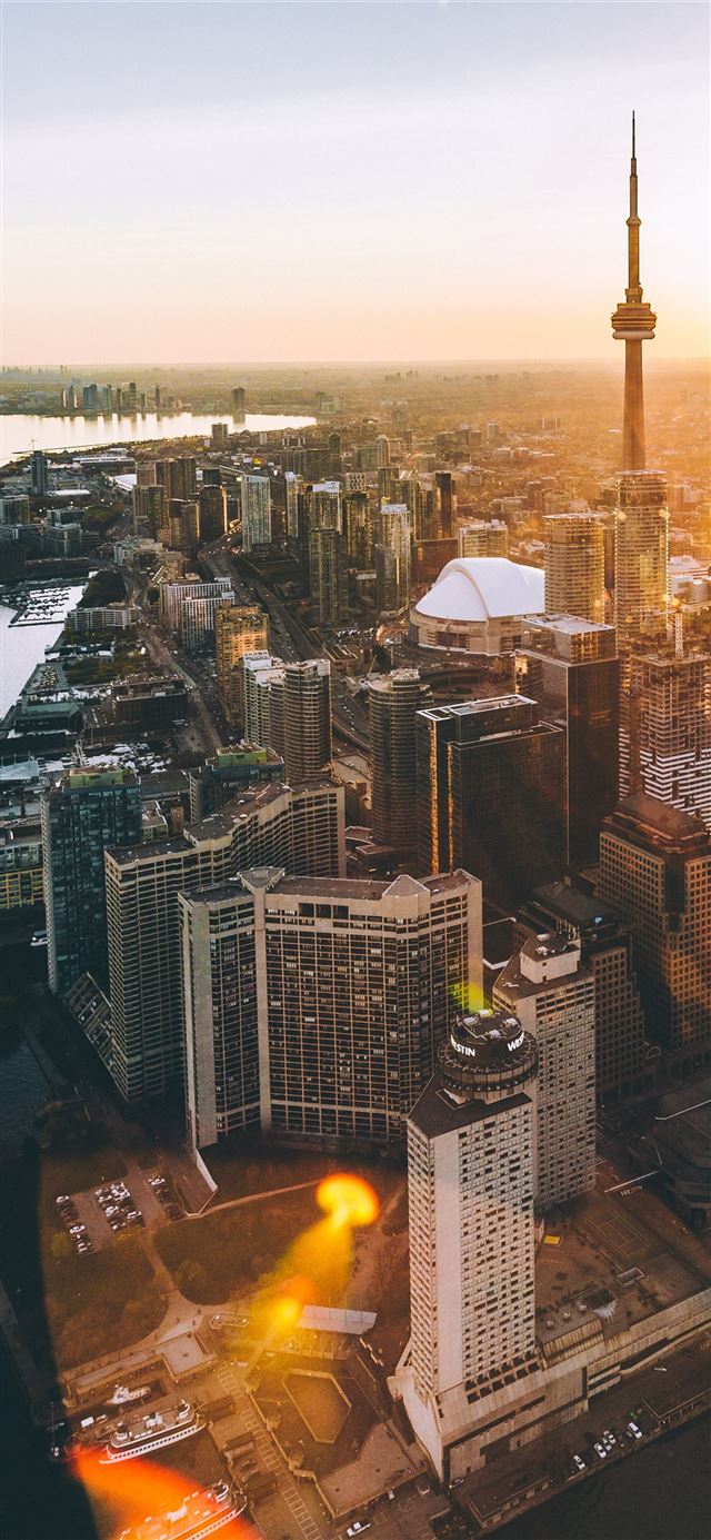 1125x2436 aerial photo of city during golden hour - sunset iPhone 11 Wallpaper