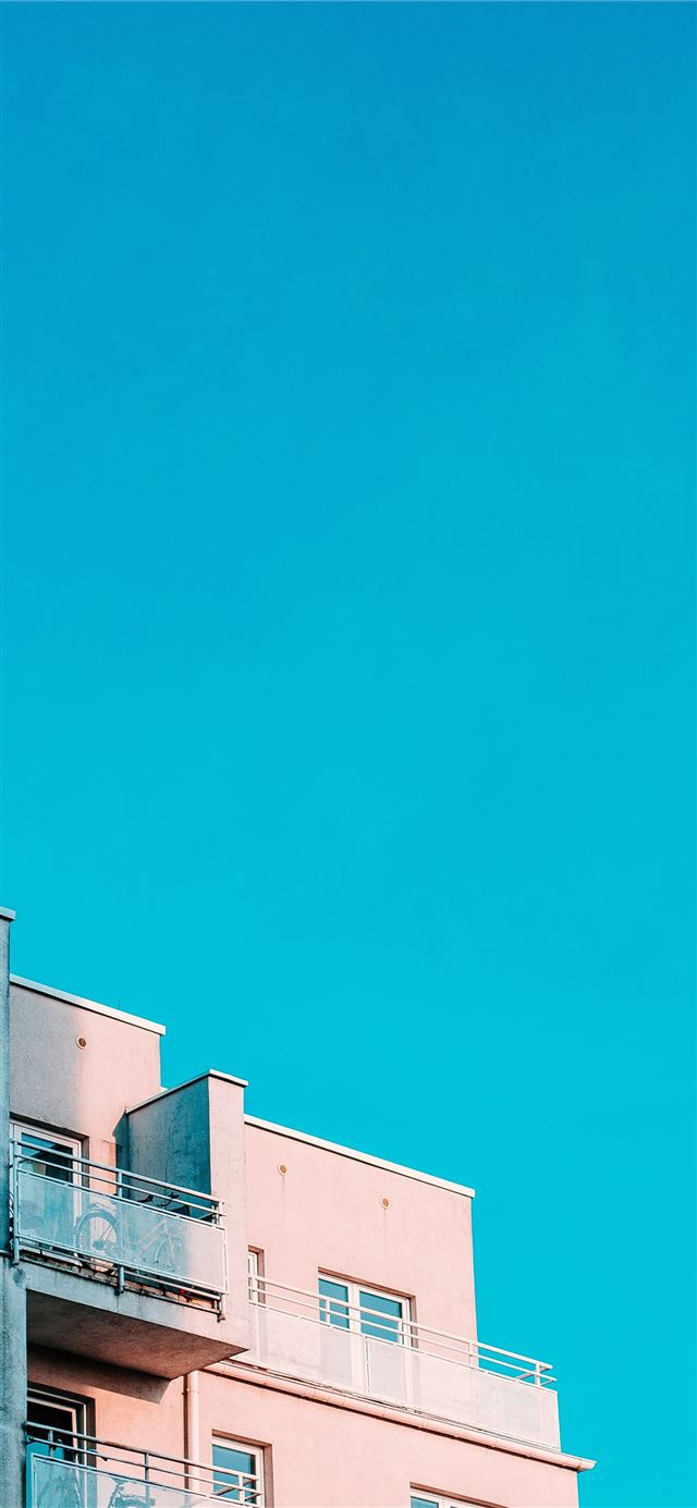 1125x2436 white structure under blue sky - poland iPhone 11 Wallpaper