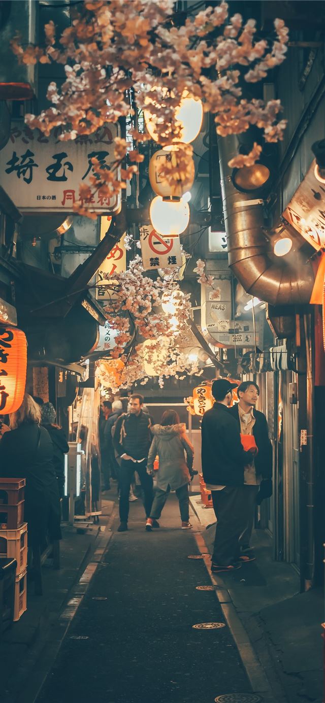 1125x2436 men in black suits standing in the hallway - tokyo iPhone 11 Wallpaper