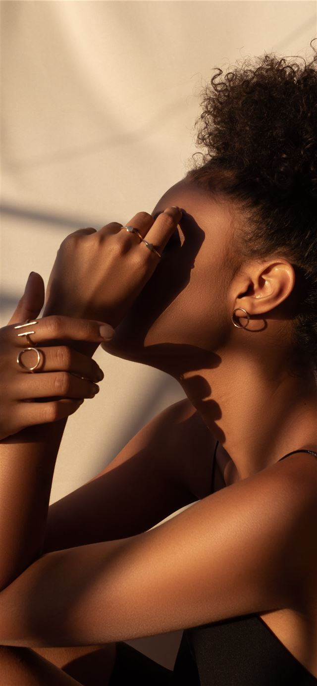 1125x2436 woman covering own face -  iPhone 11 Wallpaper