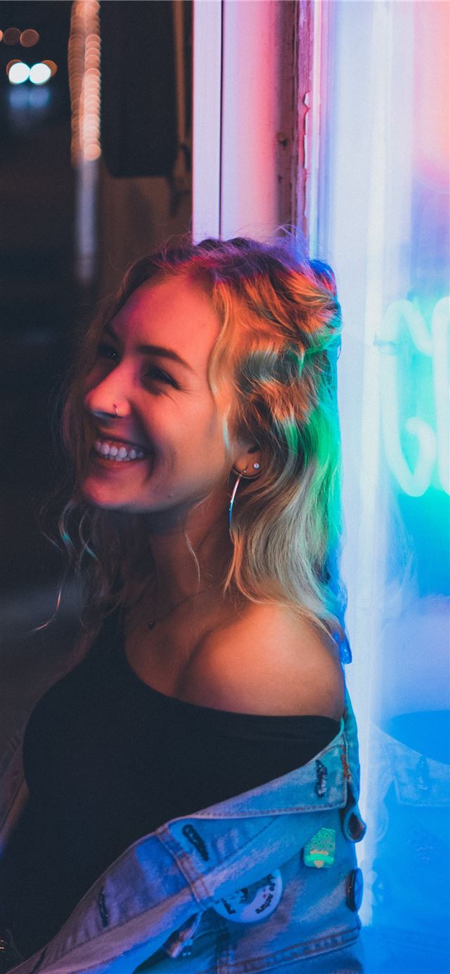 1125x2436 woman leaning on neon signage -  iPhone 11 Wallpaper