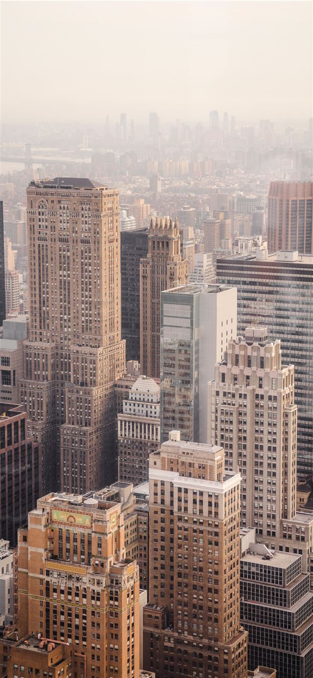 1125x2436 aerial view of city under cloudy sky during day ti... -  iPhone 11 Wallpaper