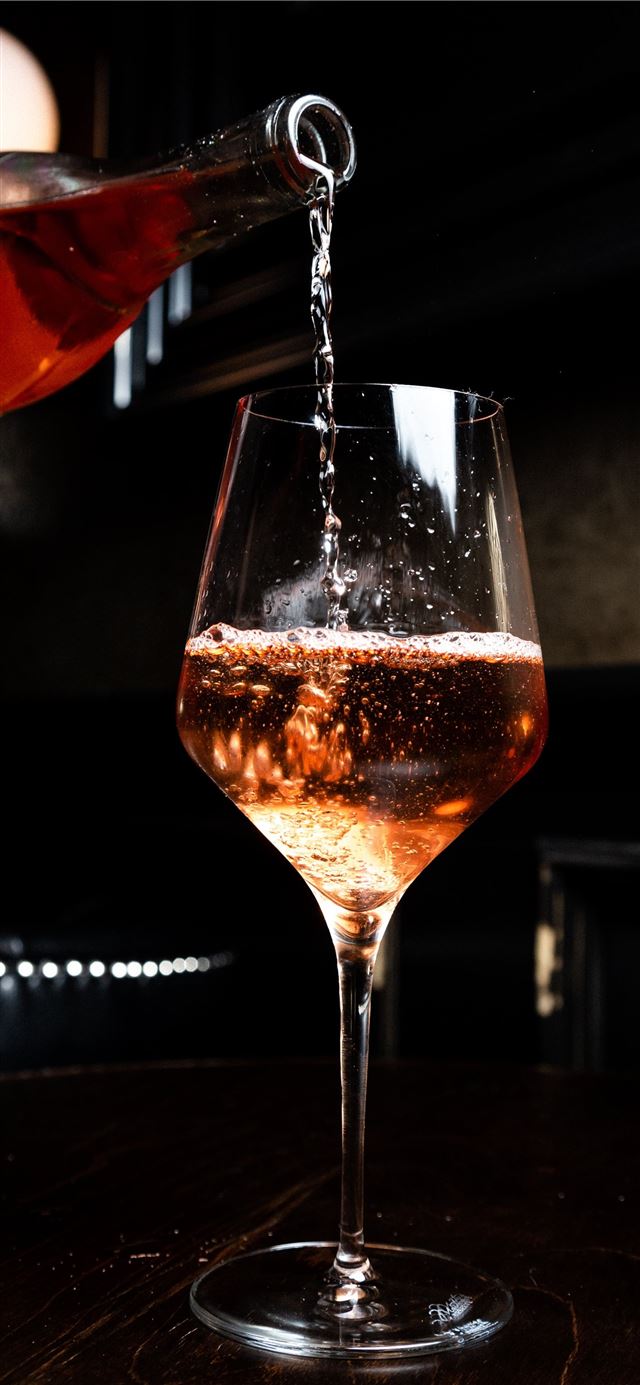 1125x2436 liquor pours in wine glass -  iPhone 11 Wallpaper