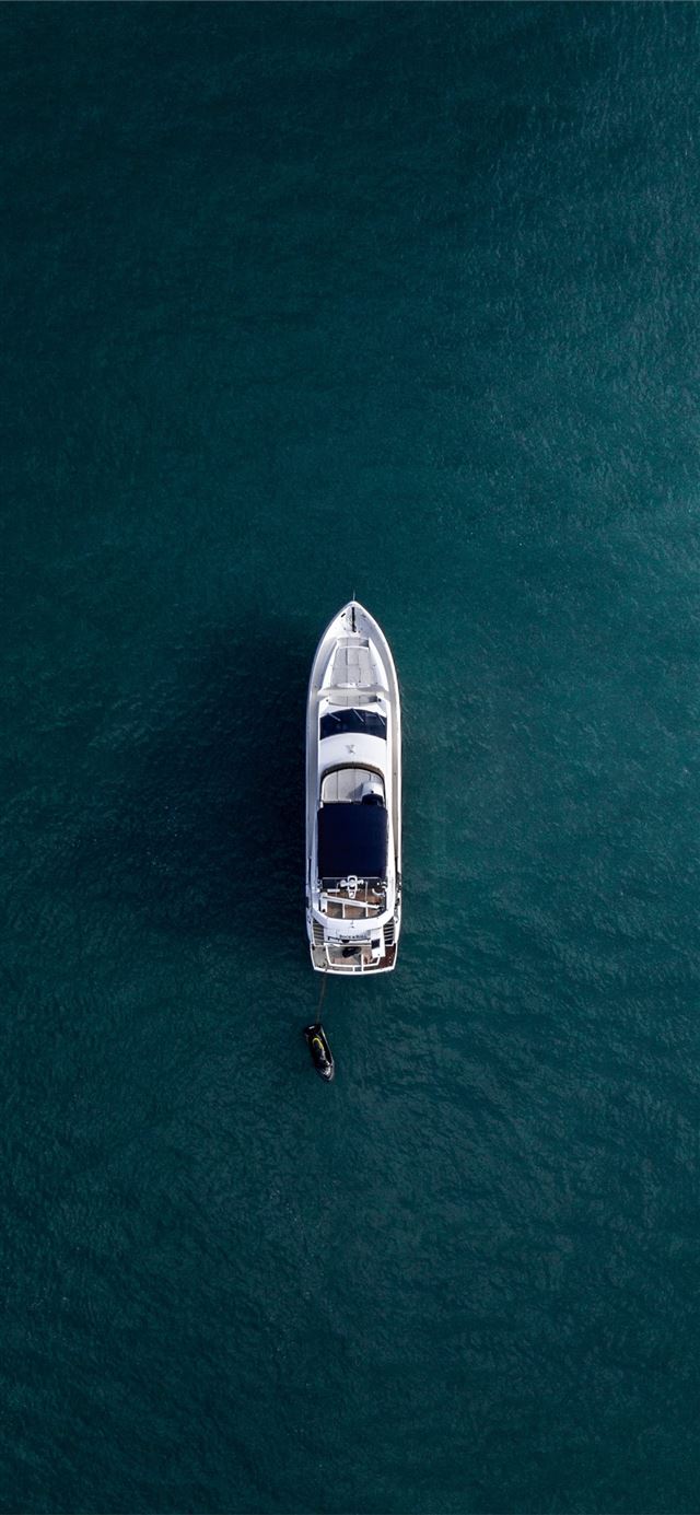 1125x2436 aerial photography of white yacht on calm waters -  iPhone 11 Wallpaper