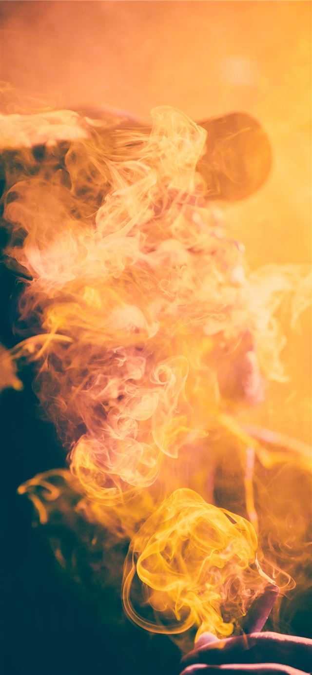 1125x2436 macro photography of man covered by cigar smoke -  iPhone 11 Wallpaper