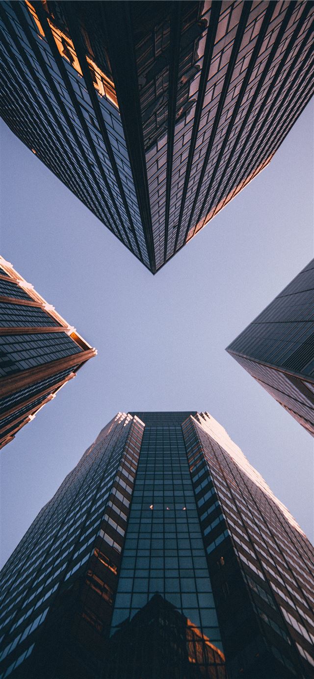 1284x2778 low angle photography of four high rise buildings -  iPhone 11 Wallpaper