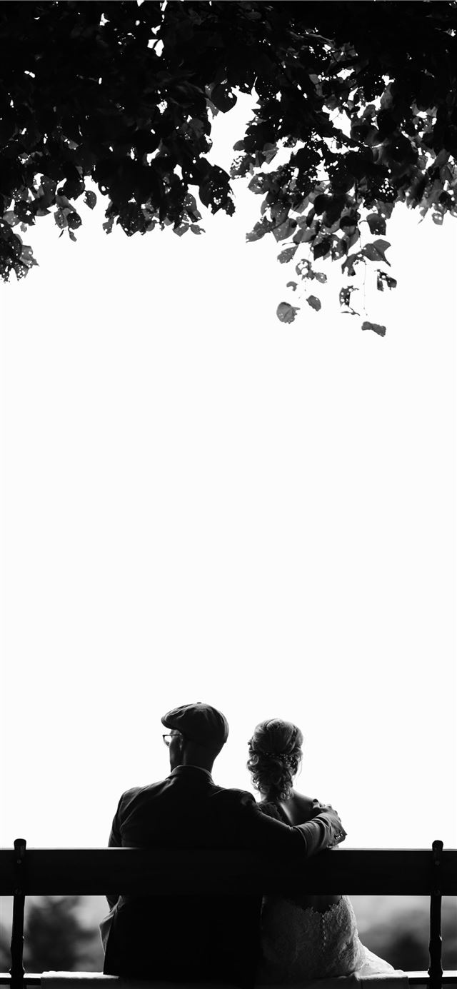 1125x2436 couple sitting on bench under tree grayscale photo... -  iPhone 11 Wallpaper
