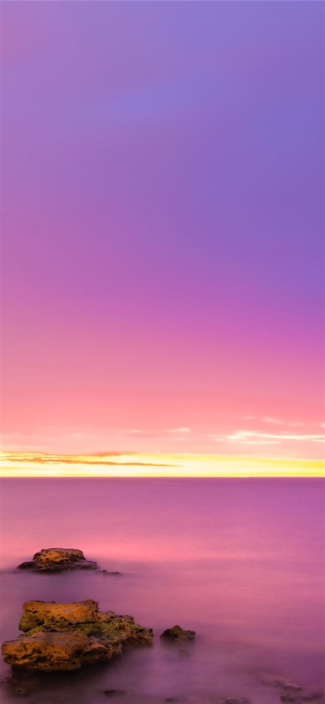 1284x2778 rock formation on body of water during sunrise -  iPhone 11 Wallpaper