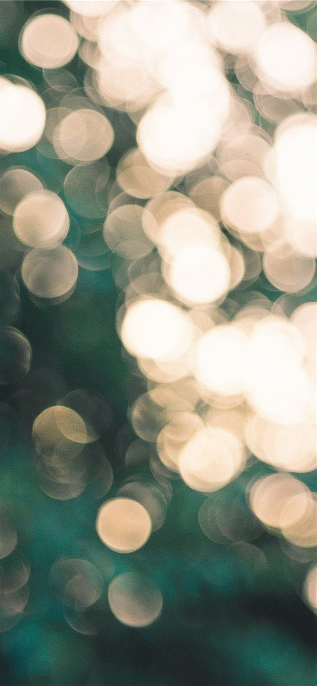 1284x2778 bokeh photography of yellow light -  iPhone 11 Wallpaper
