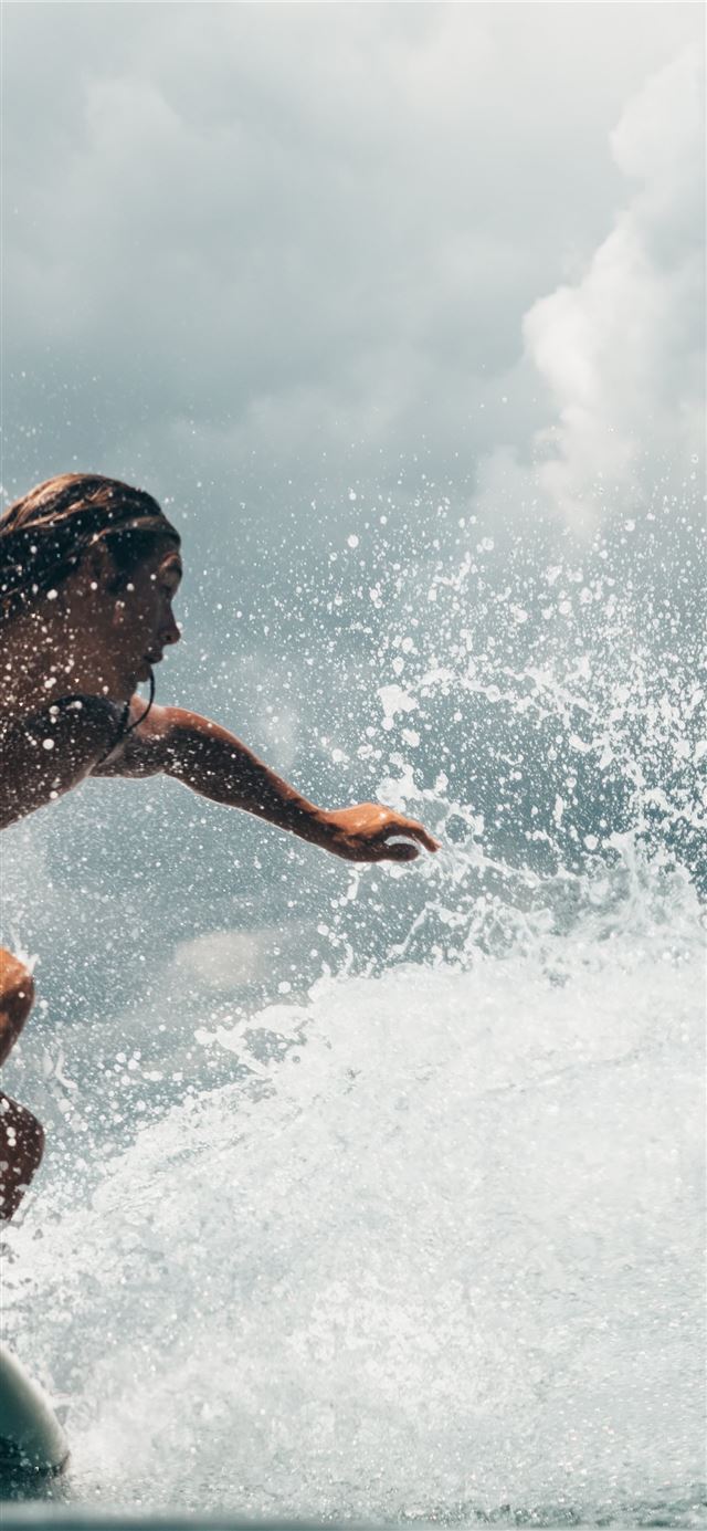 1284x2778 man surfing -  iPhone 11 Wallpaper