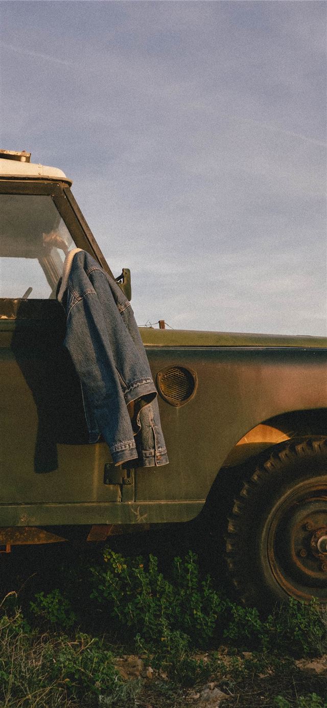 1284x2778 blue denim jacket on vehicle mirror -  iPhone 11 Wallpaper