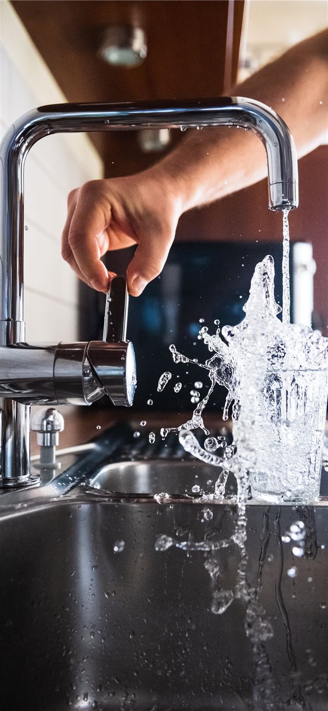 1284x2778 person opening faucet -  iPhone 11 Wallpaper