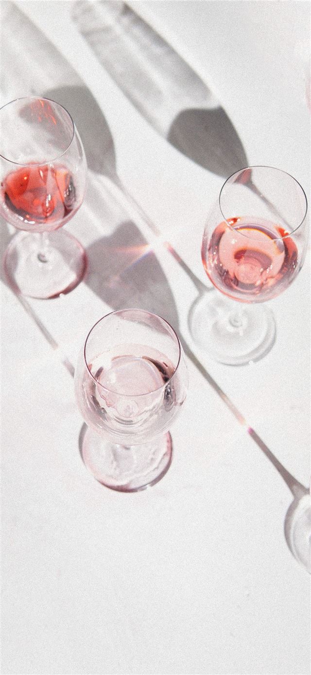 1284x2778 clear wine glasses on white table -  iPhone 11 Wallpaper