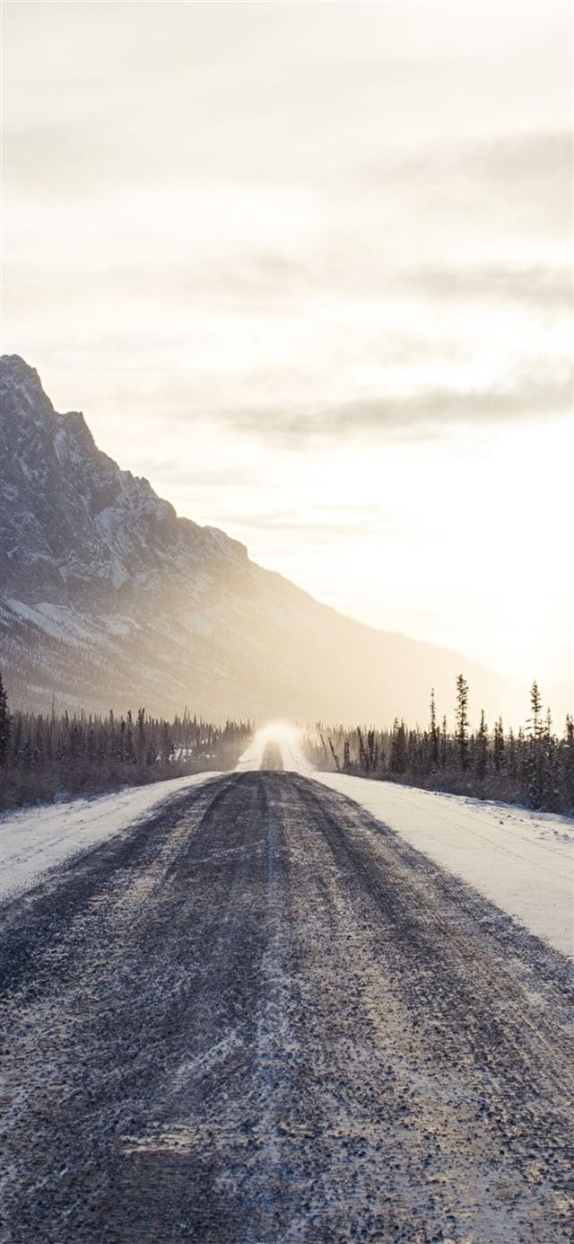 1125x2436 long road to snow mountains - road iPhone 11 Wallpaper