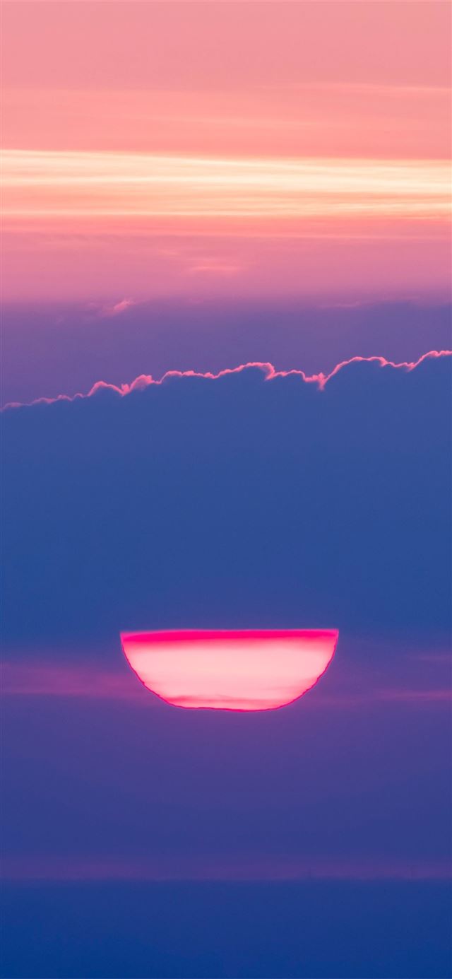 1125x2436 setting sun behind cloud 4k - sunset iPhone 11 Wallpaper