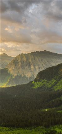 stormy sunrise at glacier national park 8k iPhone 11 wallpaper