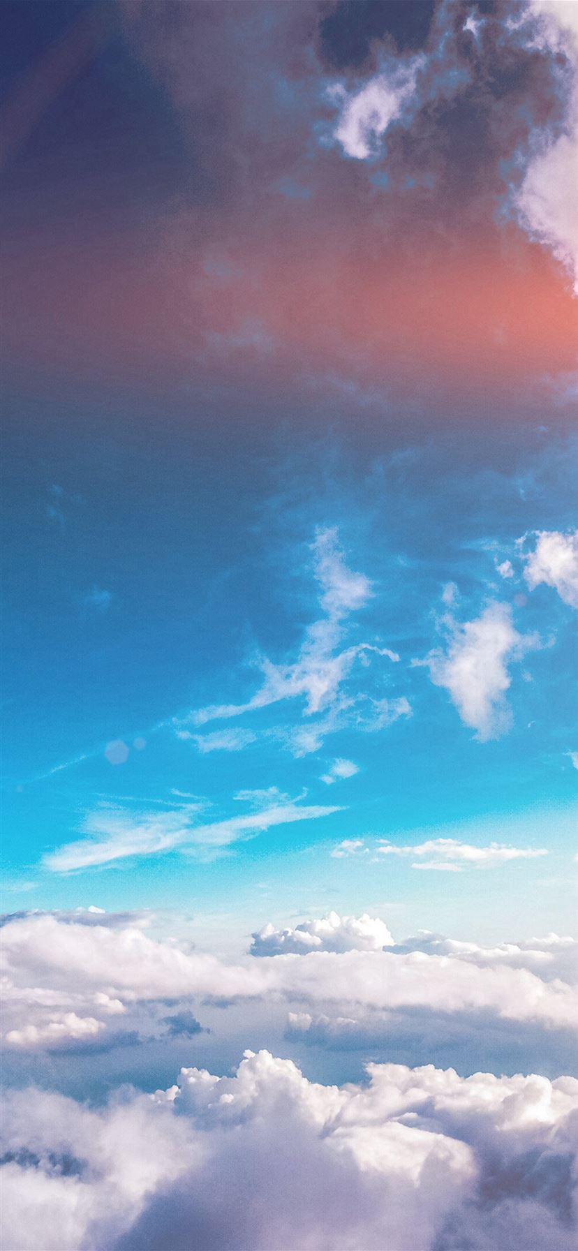 Hãy cảm nhận không gian mùa hè tươi vui ngập tràn màu sắc trên điện thoại của bạn với hình nền iPhone X. Bầu trời xanh với đám mây trắng tinh khôi cùng nắng lung linh đầy năng lượng sẽ mang đến cho bạn cảm giác tươi mới và sống động. Hãy tải ngay hình nền iPhone X của mùa hè này để trang trí cho điện thoại của bạn với một diện mạo hoàn toàn mới lạ. 