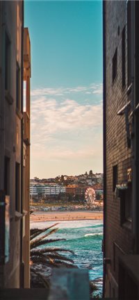 Bondi beach between two houses wallpaper