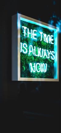 the time is always now neon light signage iPhone 11 wallpaper