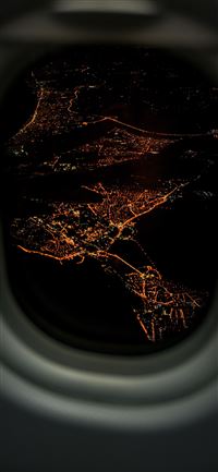 lighted city airplane view wallpaper