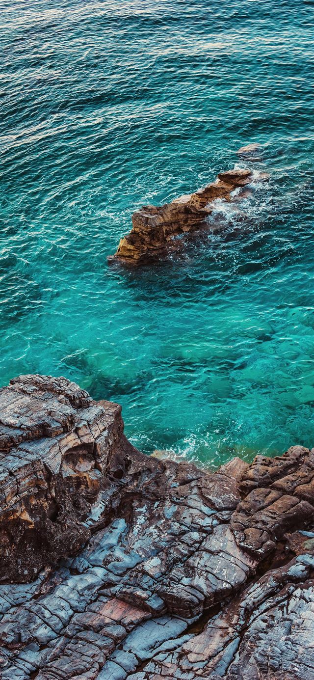 1125x2436 birds eye photography of rock formation - scenery iPhone 11 Wallpaper