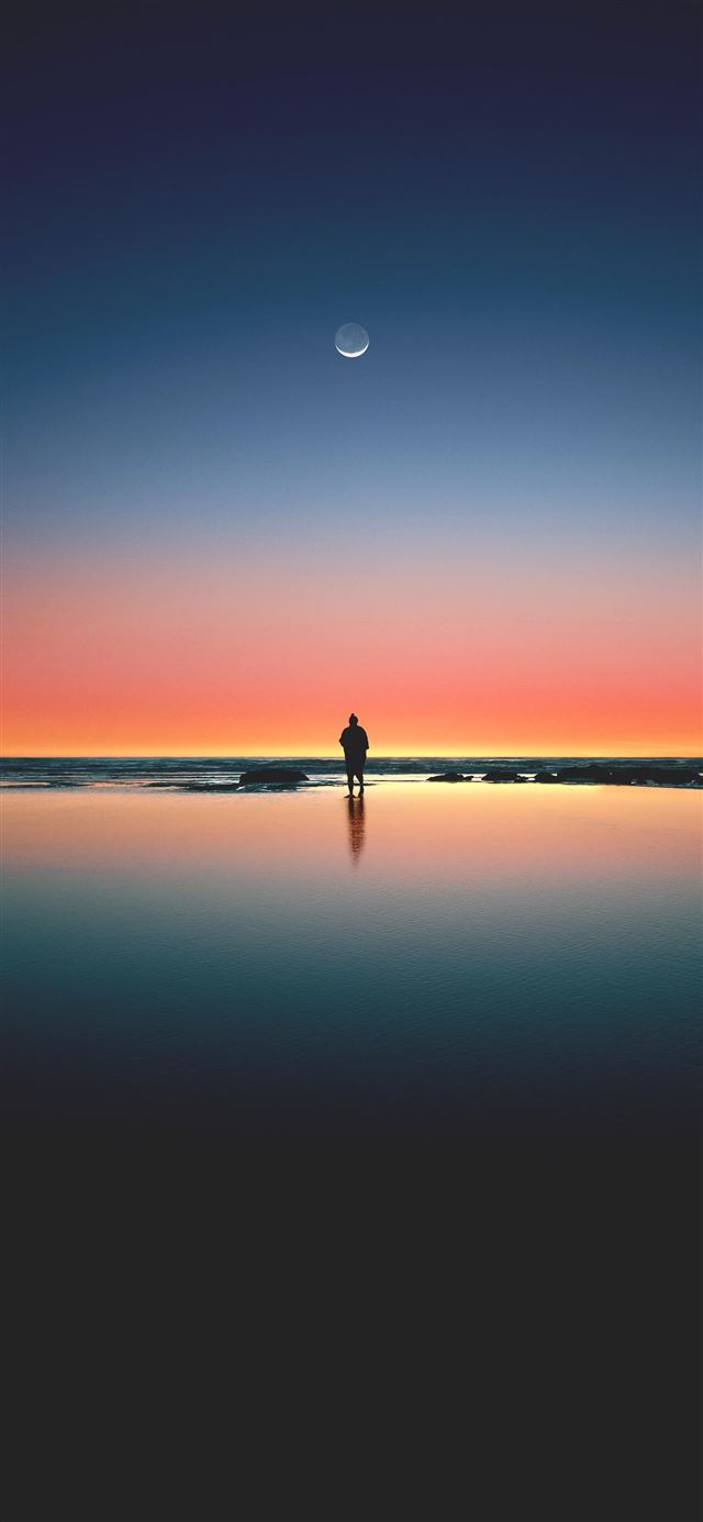 1125x2436 silhouette of man standing on seashore - sunset iPhone 11 Wallpaper