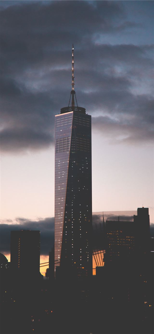 1125x2436 black tower during night time - city iPhone 11 Wallpaper