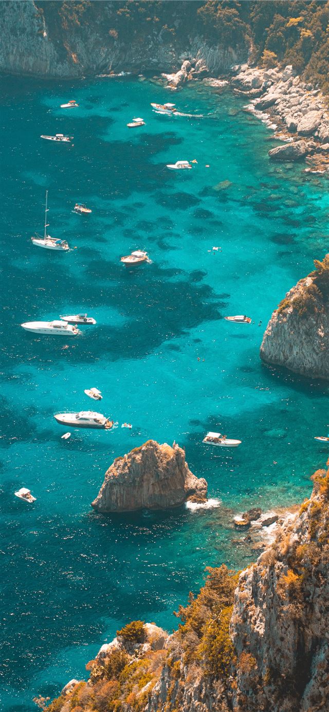 1125x2436 boats near seashore - ocean iPhone 11 Wallpaper