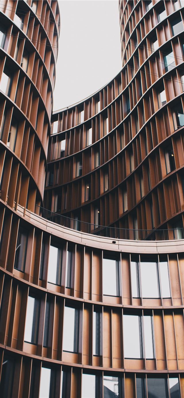 1125x2436 close up photography of brown concrete building - abstract iPhone 11 Wallpaper