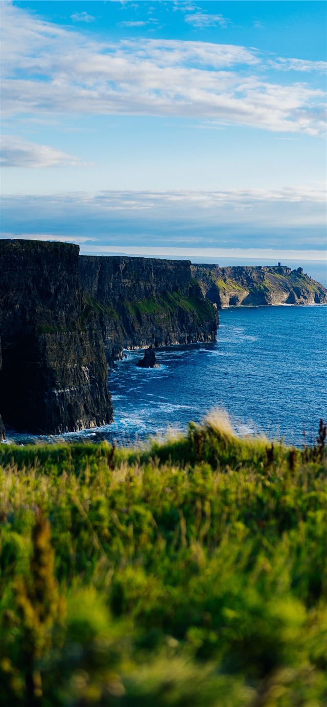 1125x2436 body of water under blue sky - nature iPhone 11 Wallpaper
