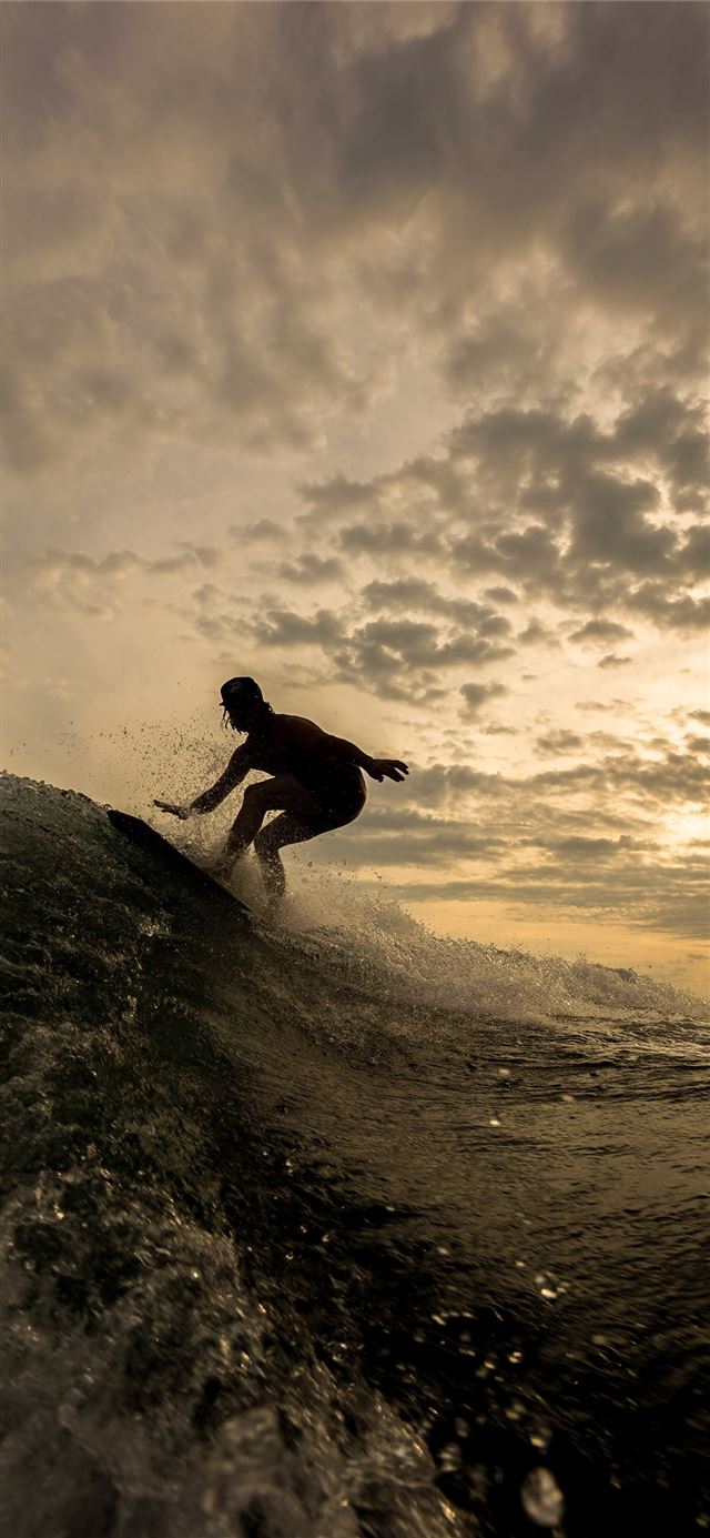 1125x2436 silhouette of person riding on surfboard -  iPhone 11 Wallpaper