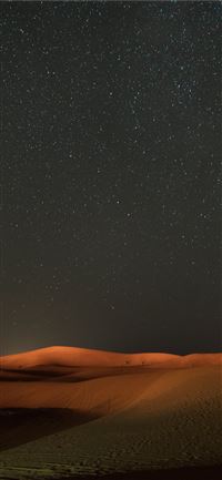 stars across the sky view at the desert iPhone 11 wallpaper