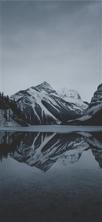 snow mountains and lake undr gray sky iPhone 11 wallpaper