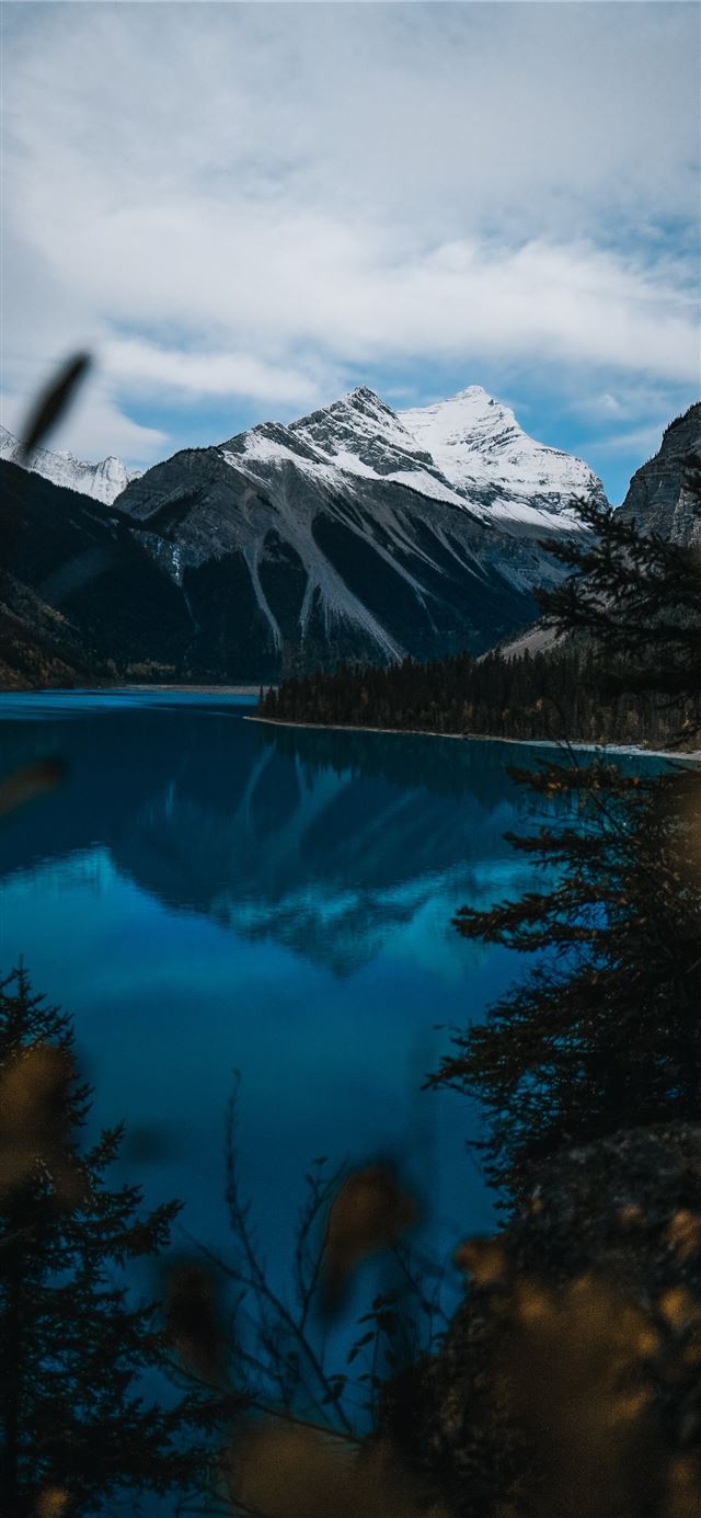 1125x2436 body of water near snow covered mountain during da... - canada iPhone 11 Wallpaper