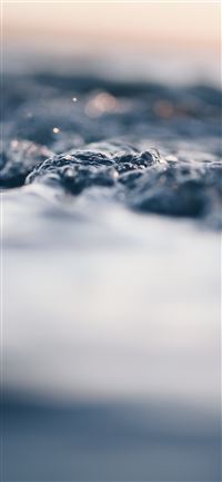 bokeh photography of body of water iPhone 11 wallpaper