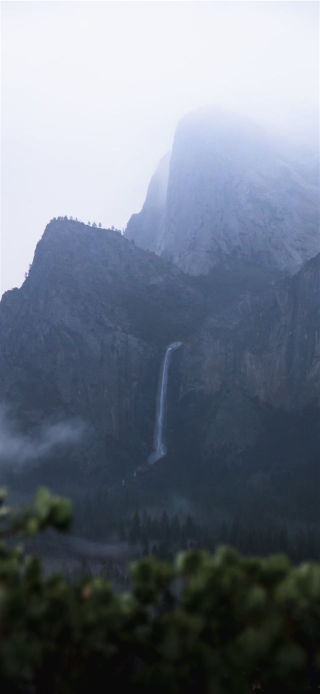 1125x2436 waterfall in mountain cliff - nature iPhone 11 Wallpaper
