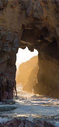 natural arch at the beach wallpaper