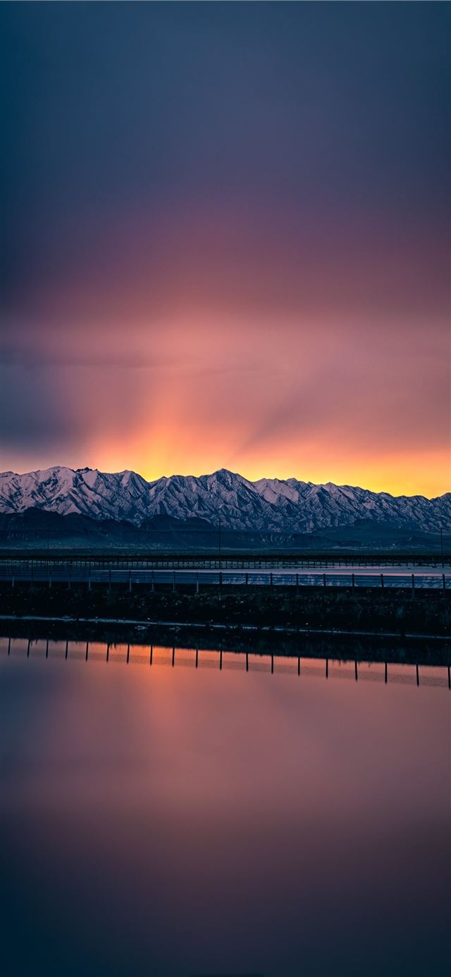1125x2436 A beautiful sunrise coming over Farnsworth Peak ju... - sunset iPhone 11 Wallpaper