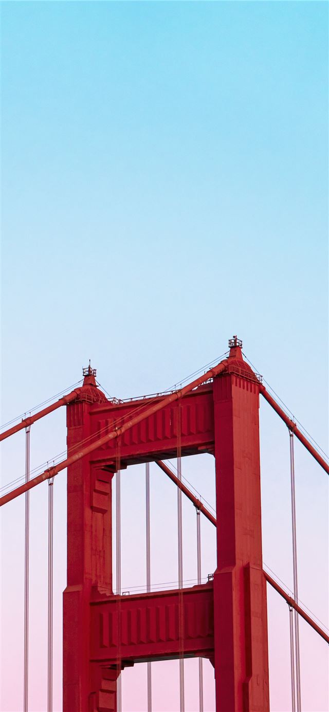 1125x2436 Golden Gate Bridge under a calm blue sky - sunset iPhone 11 Wallpaper