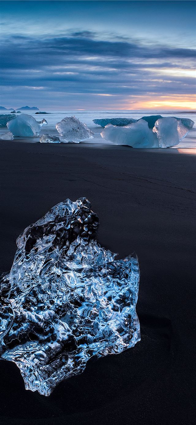 1125x2436 shallow focus photo of body of water - iceland iPhone 11 Wallpaper