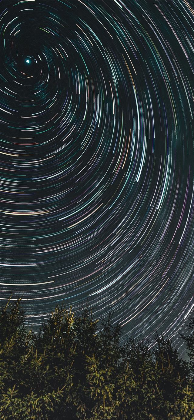1125x2436 time lapse photography of shooting stars - outer space iPhone 11 Wallpaper