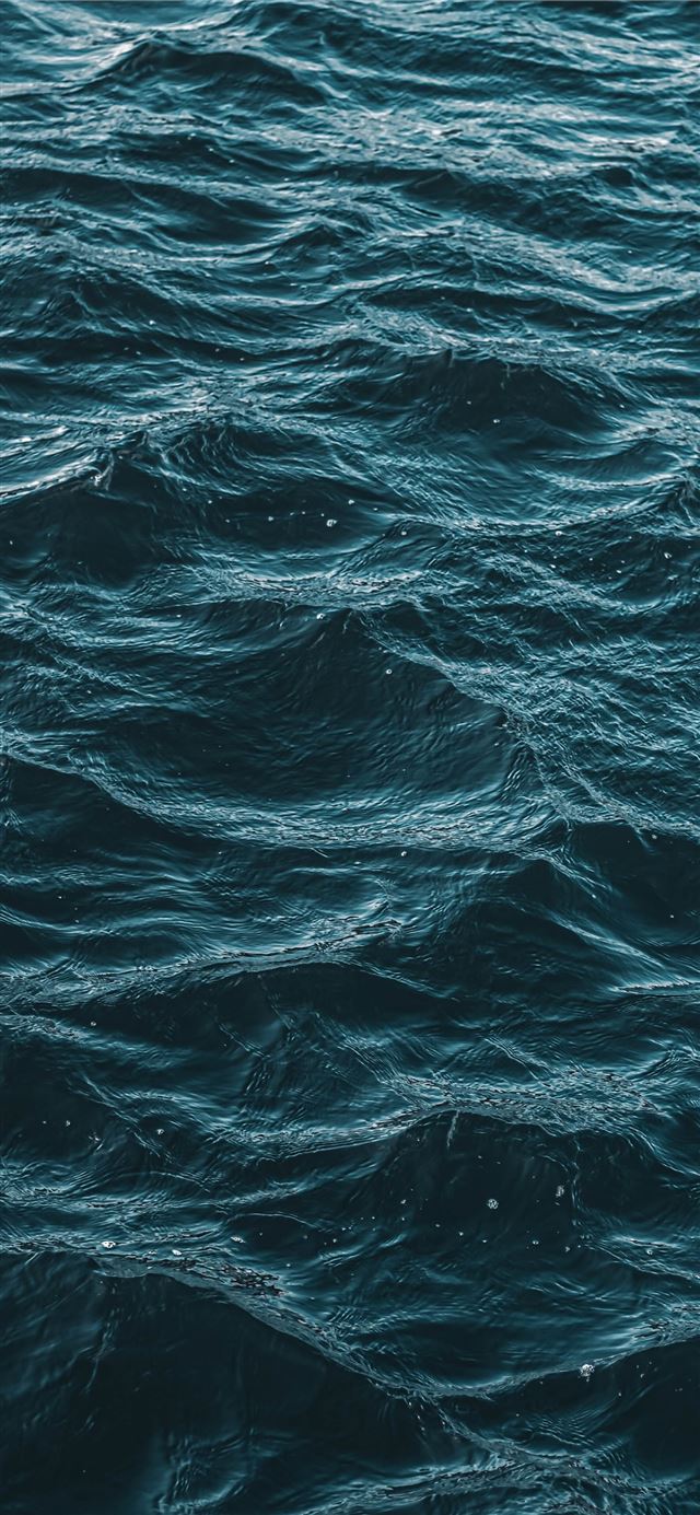 1125x2436 body of water during daytime - ocean iPhone 11 Wallpaper