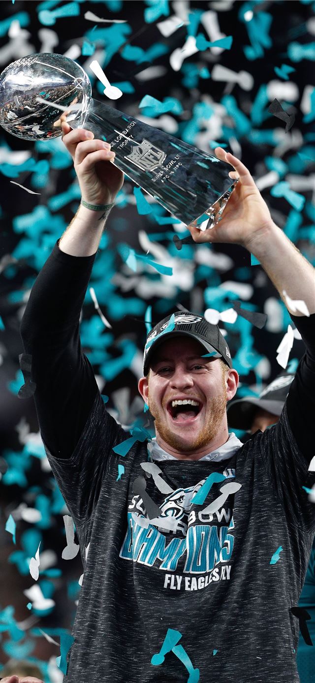 1125x2436 Hold the Lombardi Trophy high Carson you earned it... - american football celebrity iPhone 11 Wallpaper