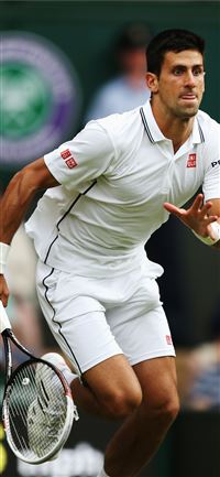 Novak Djokovic of Serbia chases down a ball during... iPhone 11 wallpaper