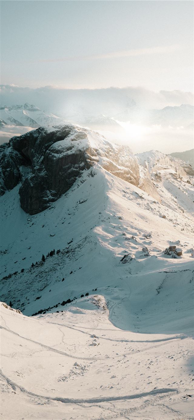 1125x2436 snow covered mountain during daytime - sports iPhone 11 Wallpaper