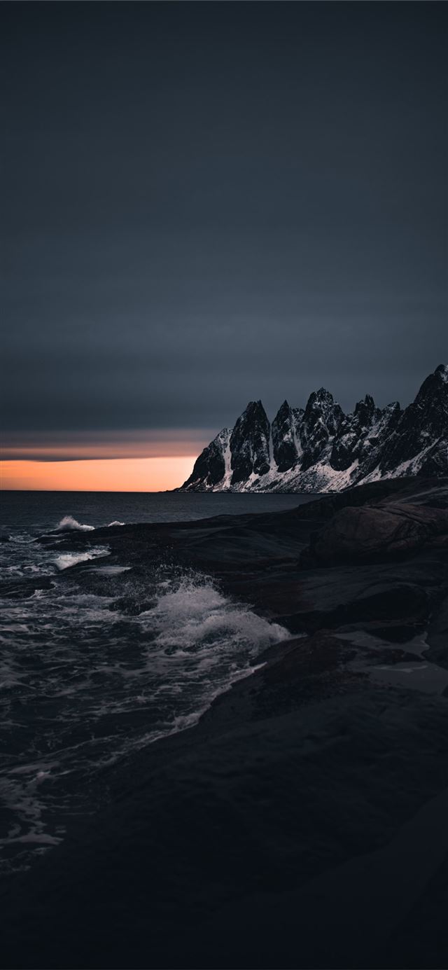 1125x2436 rocky mountain near body of water during sunset - sunset iPhone 11 Wallpaper